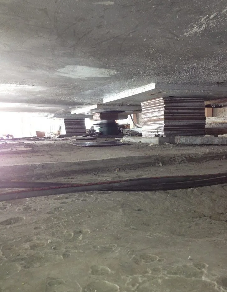 Steel cribbing supporting the raised structure